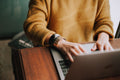 A professional sitting correctly at an office desk